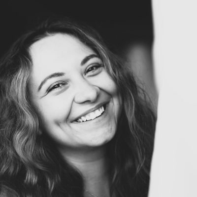 portrait-of-happy-smiling-redhead-curly-young-wom-2025-02-22-04-38-57-utc (1) (1)